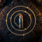 Anandham gold — flat lay on volcanic stone